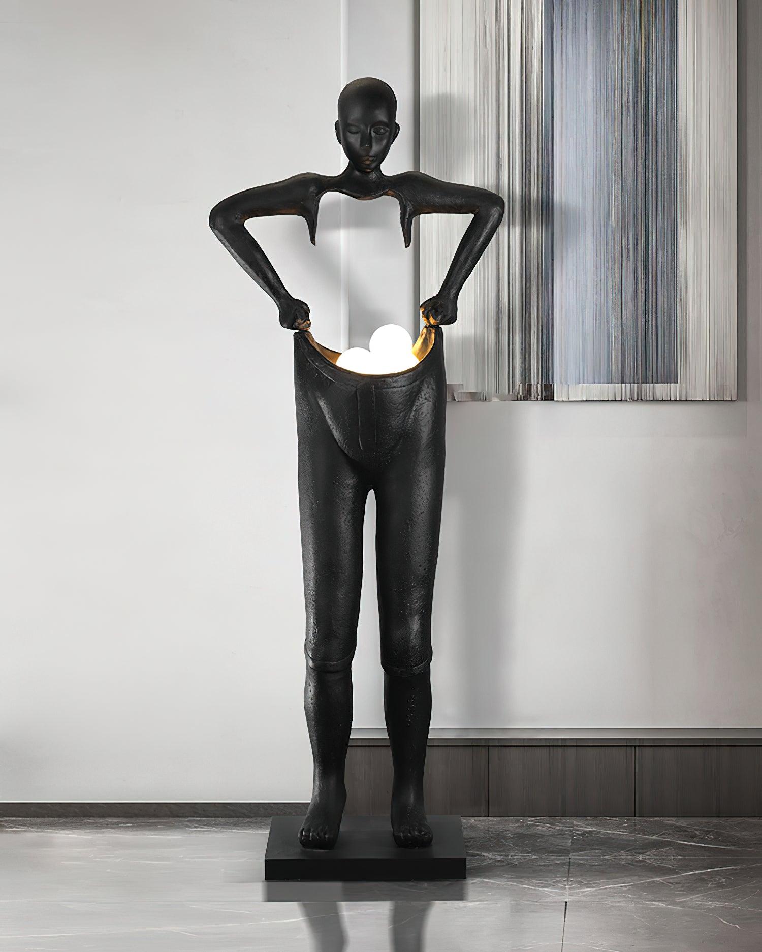 Man Carrying Pants Statue Floor Lamp